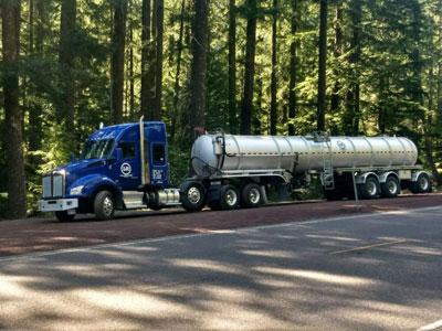 L&R Group Truck pulled over for a break in the forest.